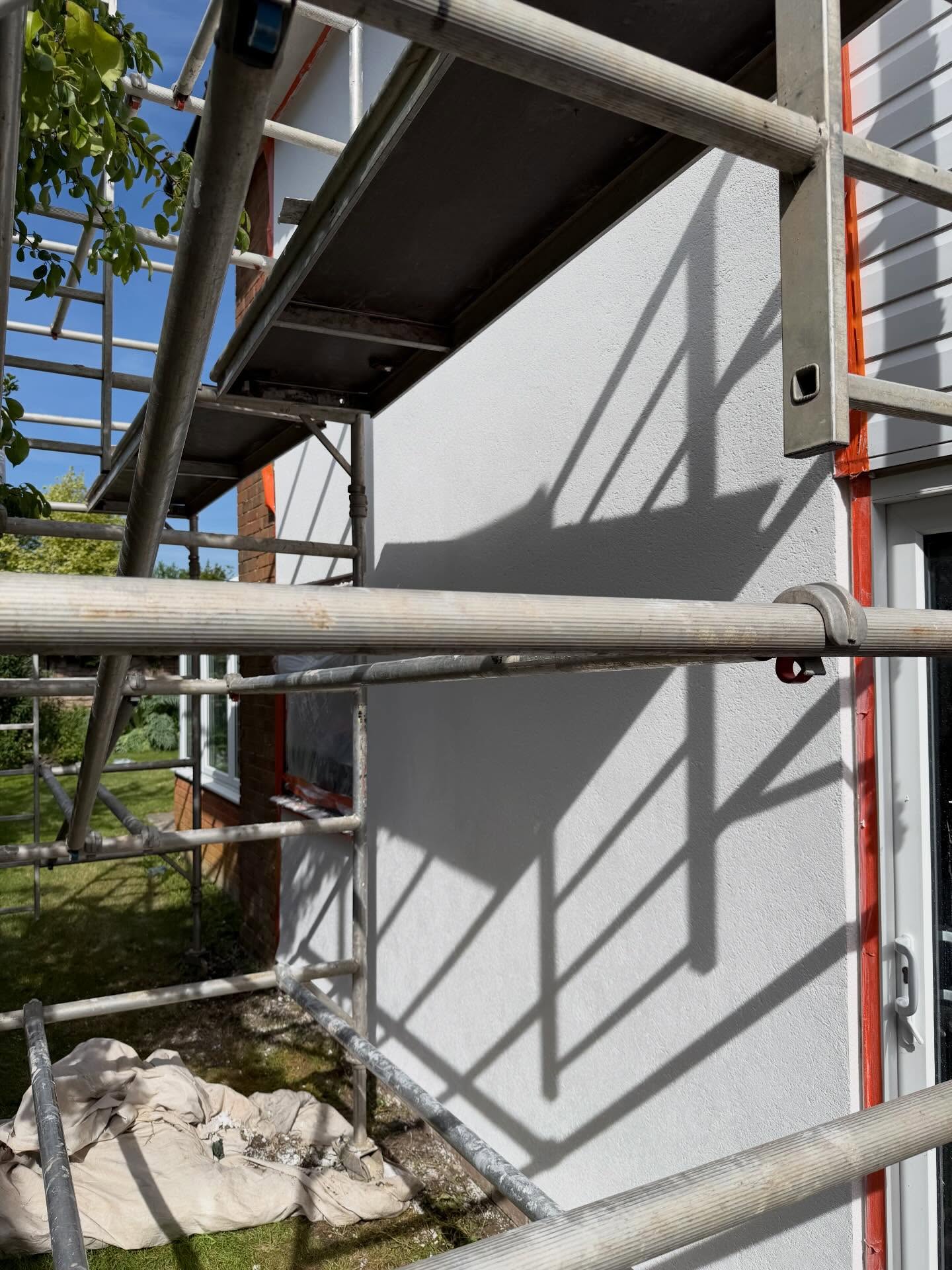 External wall rendering on scaffolding